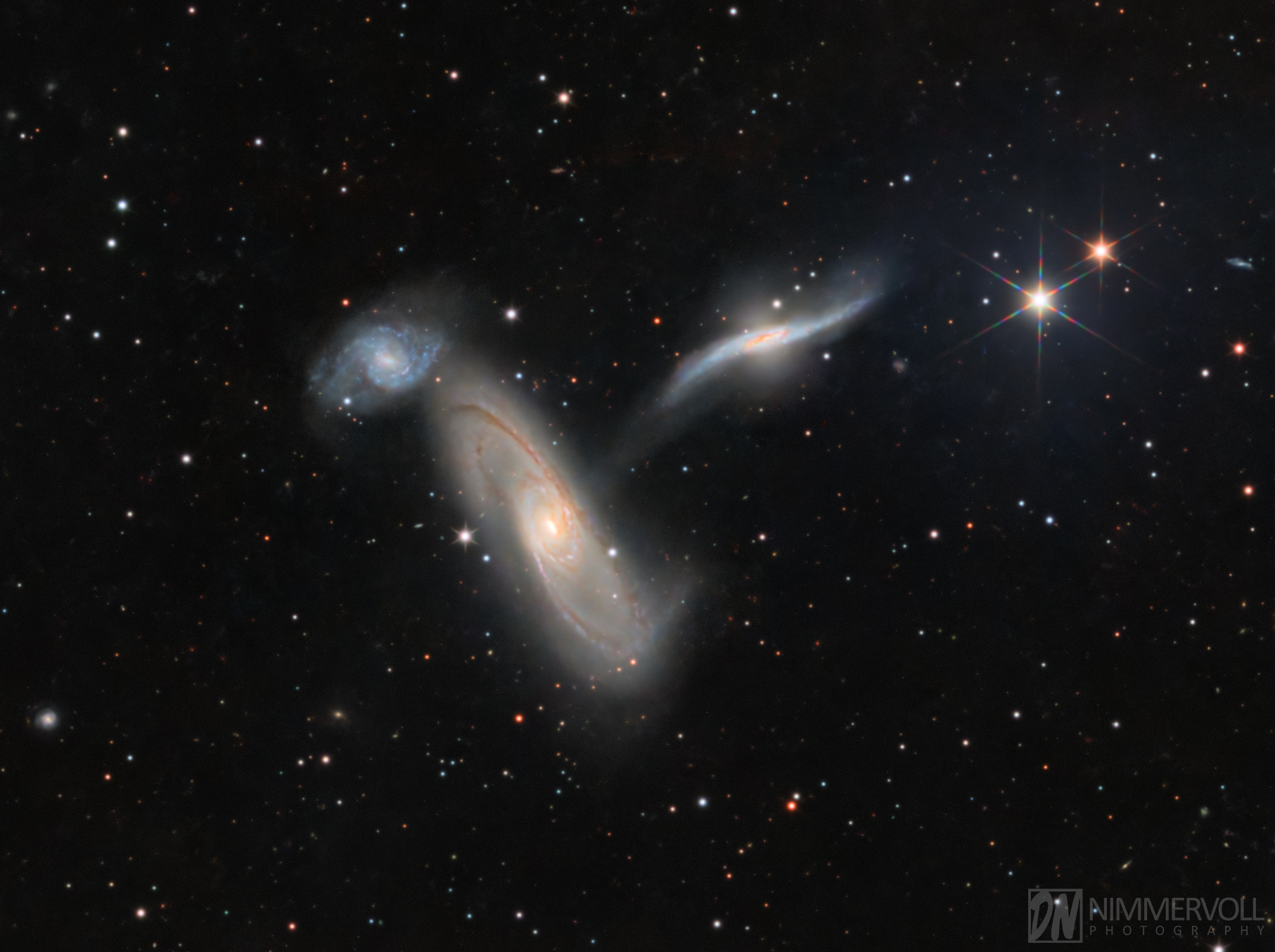 Arp 268: NGC 5566 · NGC 5560 · NGC 5569