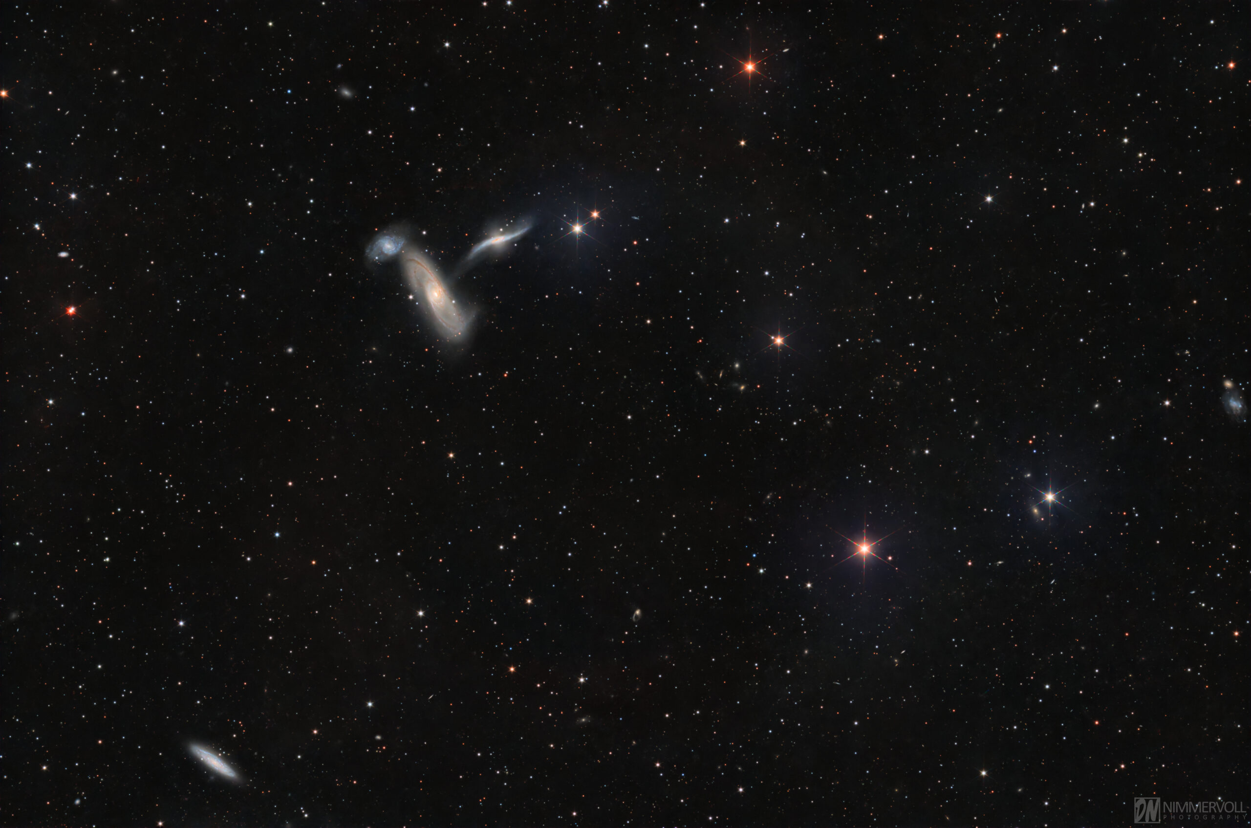 Arp 268: NGC 5566 · NGC 5560 · NGC 5569